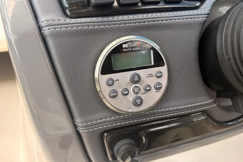 Slide: The Image of MB Quart Nautic audio system on 2011 Monterey 204FS boat dashboard. - 20