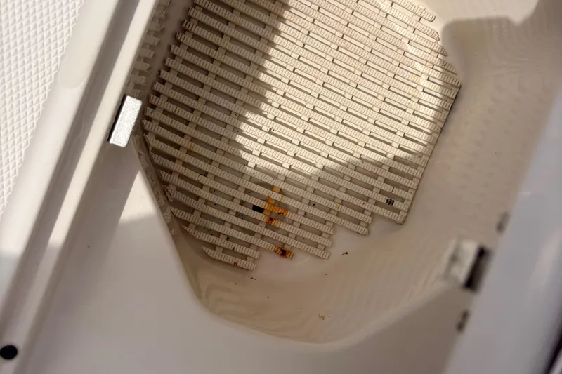 Slide: The Image of Interior of a 2011 Monterey 204FS boat with a textured compartment. - 31