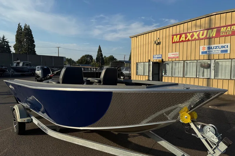 Slide: The Image of 2026 Fish Rite River Master 18 boat on trailer at Maxxum Marine dealership. - 0