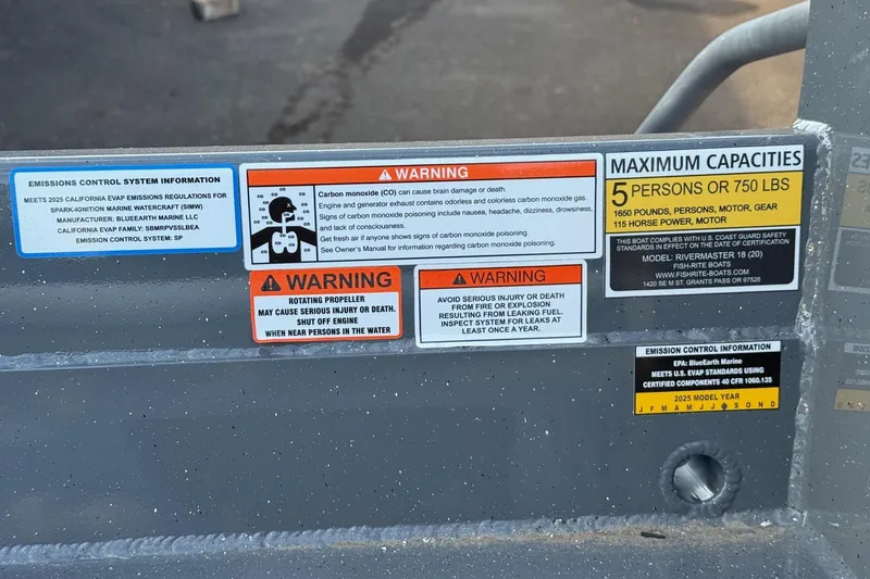 Slide: The Image of Safety and capacity labels on a 2026 Fish Rite River Master 18 boat. - 13