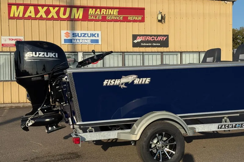 Slide: The Image of 2026 Fish Rite River Master 18 boat with Suzuki motor at Maxxum Marine dealership. - 2
