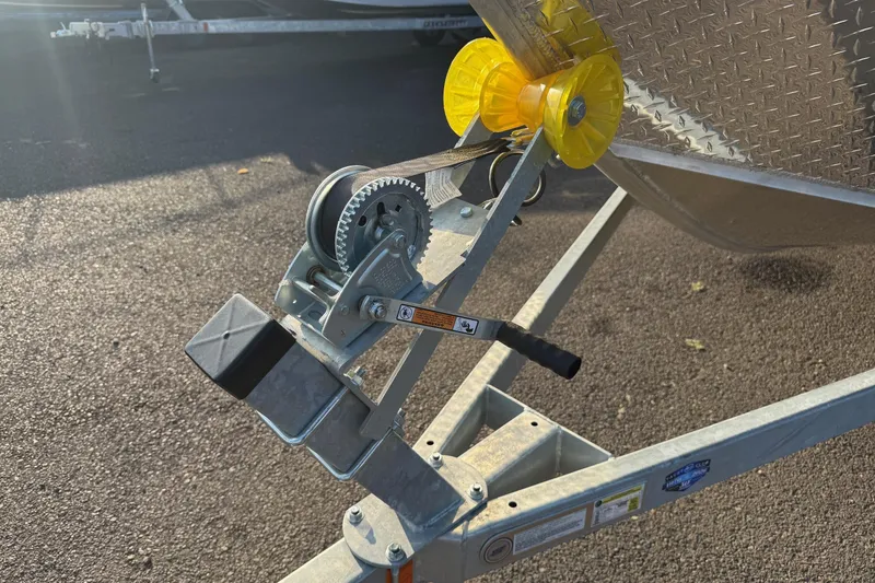 Slide: The Image of Winch and bow stop on 2026 Fish Rite River Master 18 boat trailer. - 26
