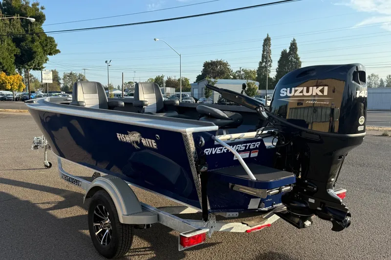 Slide: The Image of 2026 Fish Rite River Master 18 boat with Suzuki 140 engine on trailer. - 4