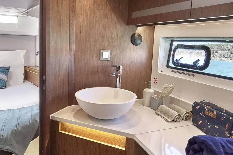 Slide: The Image of Luxurious bathroom interior of 2026 Beneteau Antares 12 Fly OB yacht with modern amenities. - 13