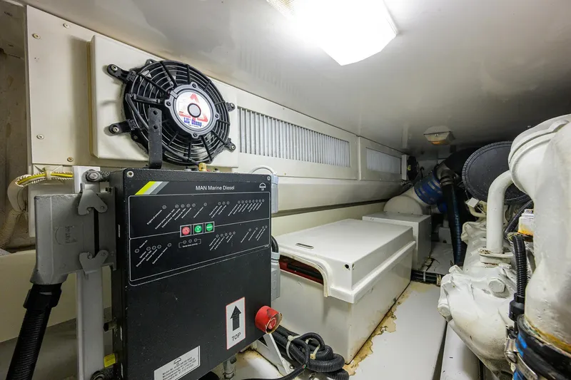 Slide: The Image of Engine room of 2004 Viking 48 Convertible yacht with MAN Marine Diesel system. - 24