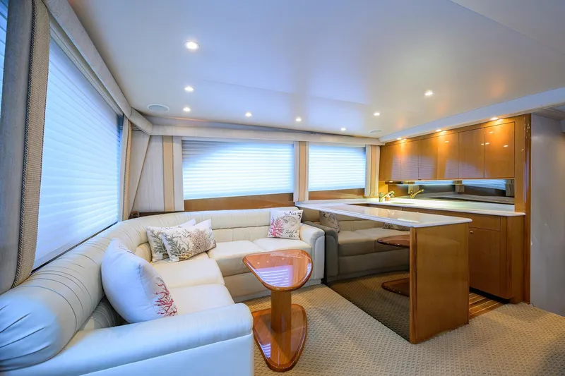 Slide: The Image of Luxurious interior of 2004 Viking 48 Convertible yacht with elegant seating and modern kitchen. - 33