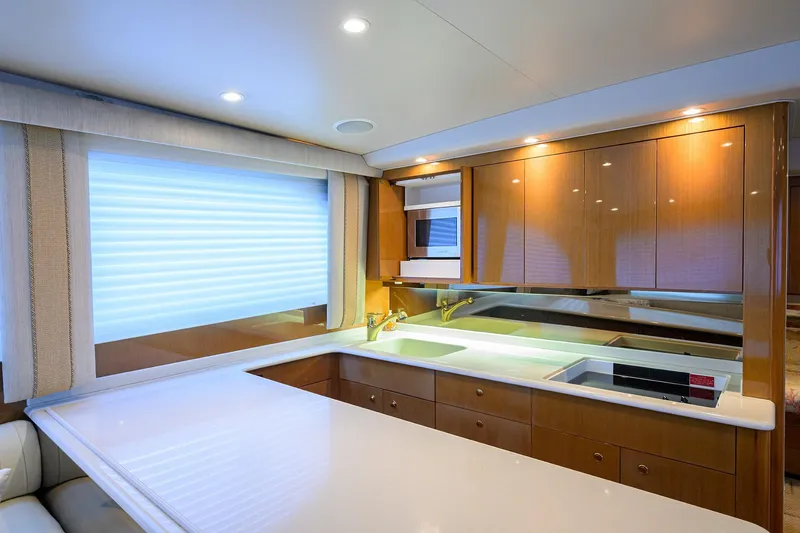 Slide: The Image of Luxurious kitchen interior of 2004 Viking 48 Convertible yacht with modern amenities. - 35
