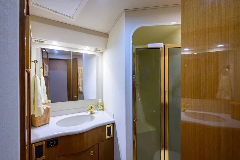 Slide: The Image of Luxurious bathroom in 2004 Viking 48 Convertible yacht with modern fixtures and shower. - 42