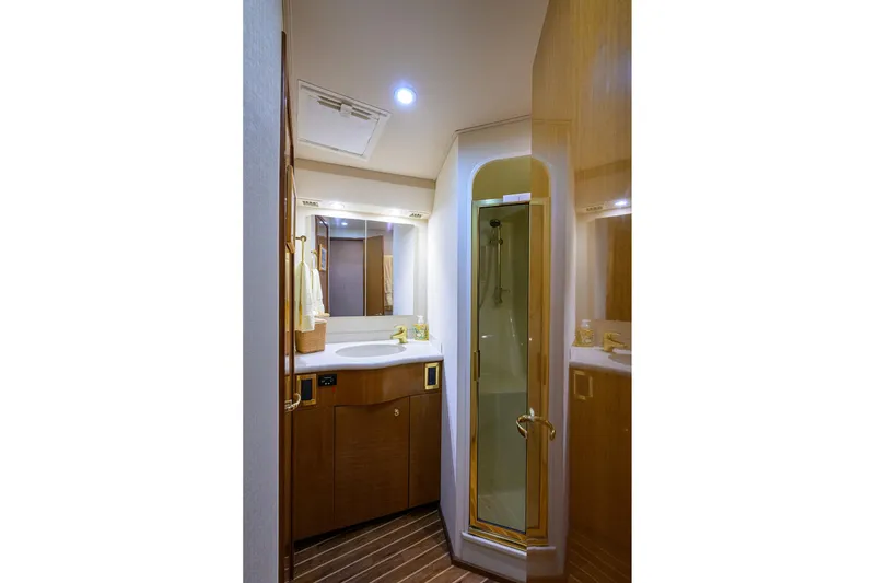 Slide: The Image of Luxurious bathroom in 2004 Viking 48 Convertible yacht with shower and vanity. - 44
