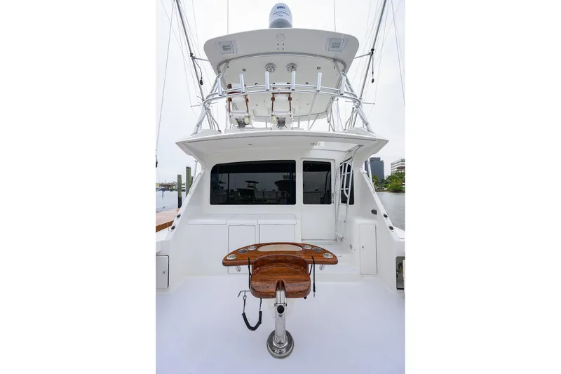 Slide: The Image of 2004 Viking 48 Convertible yacht, rear view with fishing chair and upper deck. - 69