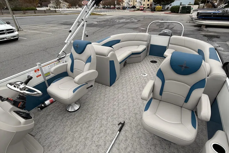 Slide: The Image of 2025 Berkshire 24RFX LE 2.75 pontoon boat interior with plush seating and modern design. - 20