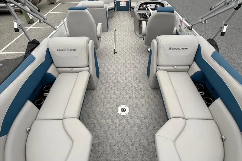 Slide: The Image of 2025 Berkshire 24RFX LE 2.75 pontoon boat interior with plush seating and modern design. - 21