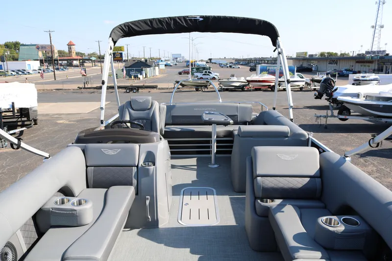 Slide: The Image of 2025 Bennington 22 LSWING BACK pontoon boat with spacious seating and modern design. - 10