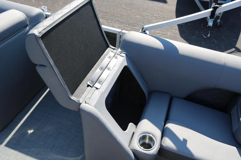 Slide: The Image of 2025 Bennington 22 LSWING BACK boat seat with storage compartment and cup holder. - 22