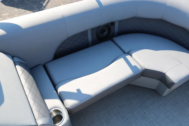 Slide: The Image of Luxurious seating on 2025 Bennington 22 LSWING BACK pontoon boat with cup holder. - 23