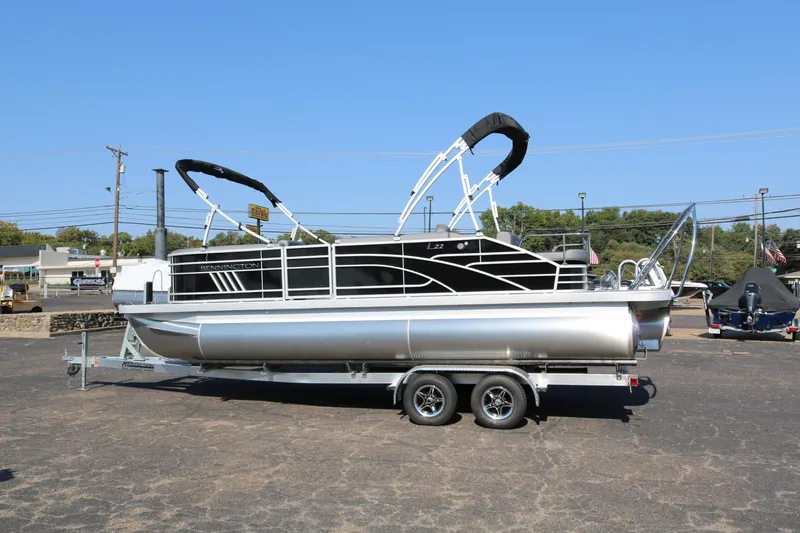Slide: The Image of 2025 Bennington 22 LSWING BACK pontoon boat on trailer, side view. - 5