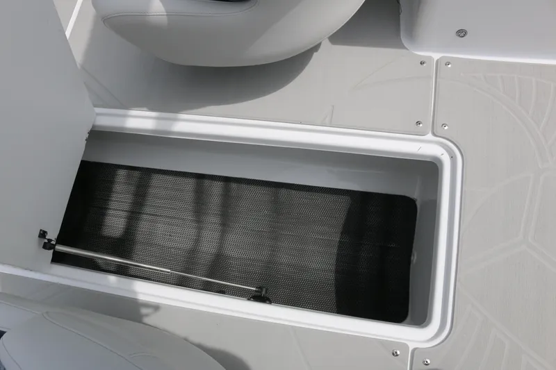 Slide: The Image of Storage compartment on 2026 Scarab 215 SE boat, featuring sleek design and durable materials. - 14
