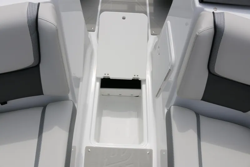 Slide: The Image of 2026 Scarab 215 SE boat interior with open storage compartment. - 15