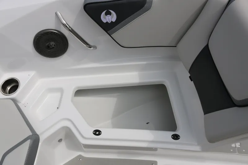 Slide: The Image of Interior of 2026 Scarab 215 SE boat, featuring seating and speaker details. - 7