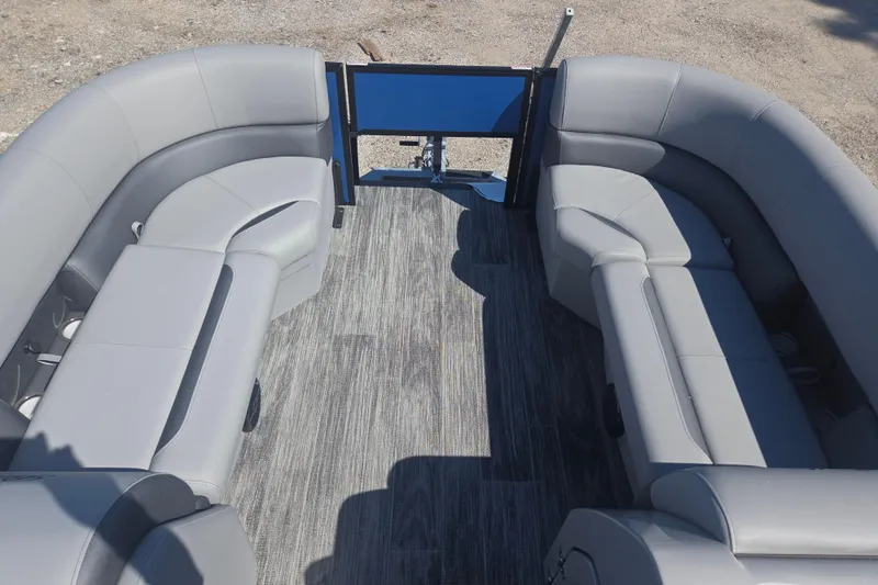 Slide: The Image of 2026 Bentley Pontoons 223 Swingback interior with gray seating and wood-style flooring. - 18