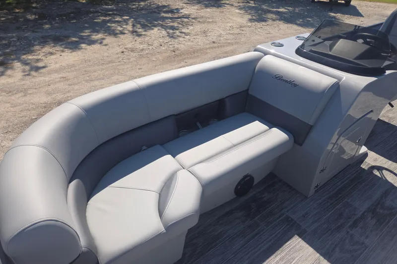 Slide: The Image of 2026 Bentley Pontoons 223 Swingback with luxurious gray seating and sleek design. - 19