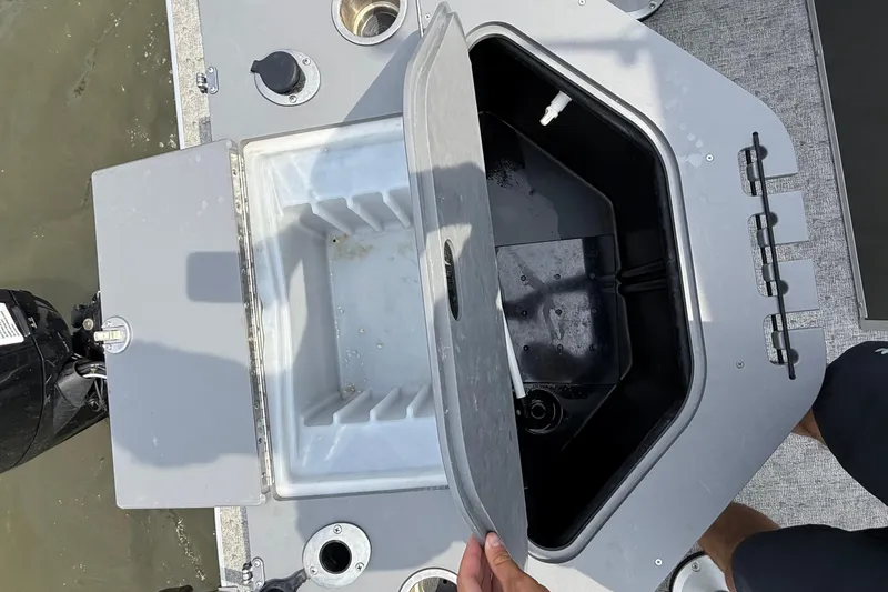 Slide: The Image of 2025 Berkshire 24RFC LE 2.75 pontoon boat interior with seating and helm. - 10