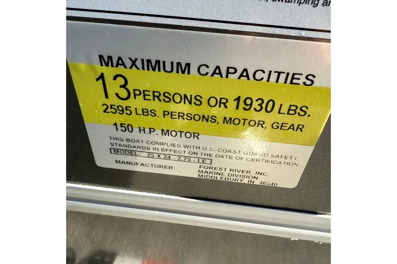 Slide: The Image of 2025 Berkshire 24RFC LE 2.75 boat capacity label, 13 persons, 1930 lbs, 150 HP motor. - 18