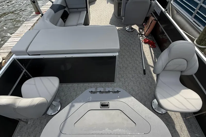 Slide: The Image of 2025 Berkshire 24RFC LE 2.75 pontoon boat interior with spacious seating and modern design. - 9
