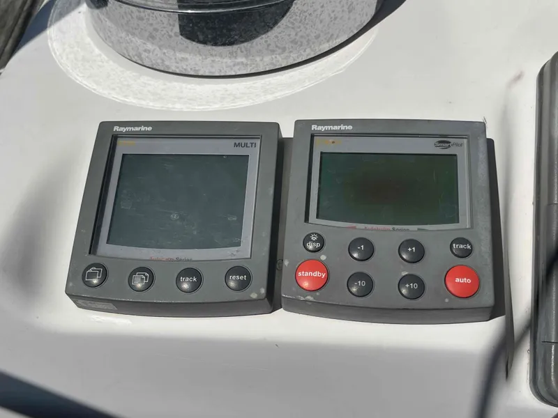 Slide: The Image of Raymarine navigation instruments on 2004 Beneteau Oceanis 473 yacht dashboard. - 43