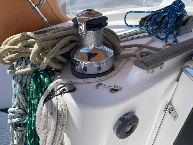 Slide: The Image of Sailing ropes and winch on 2004 Beneteau Oceanis 473 yacht deck. - 52