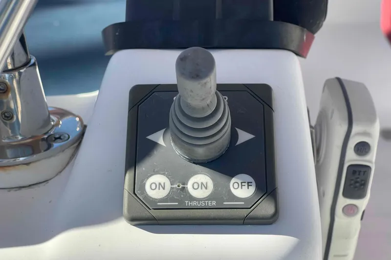 Slide: The Image of Joystick control panel on a 2004 Beneteau Oceanis 473 sailboat. - 88