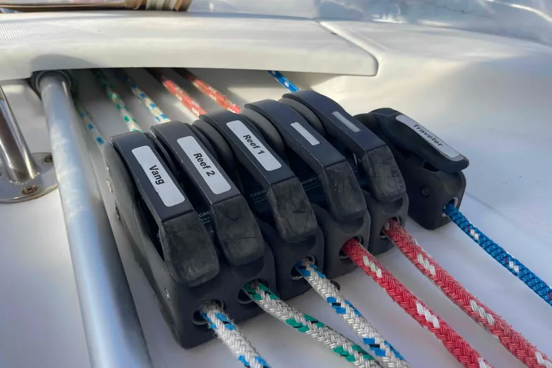 Slide: The Image of Close-up of rope clutches on a 2004 Beneteau Oceanis 473 sailboat. - 94