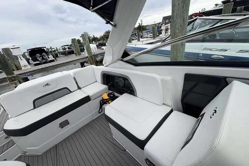 Slide: The Image of Interior of a 2016 Monterey 298SS Super Sport boat at a marina dock. - 15