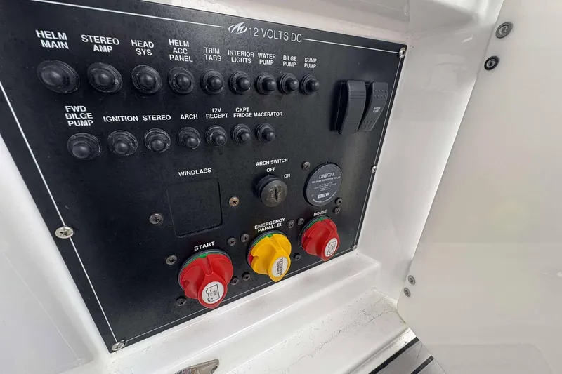 Slide: The Image of Control panel of a 2016 Monterey 298SS Super Sport boat with various switches and dials. - 17