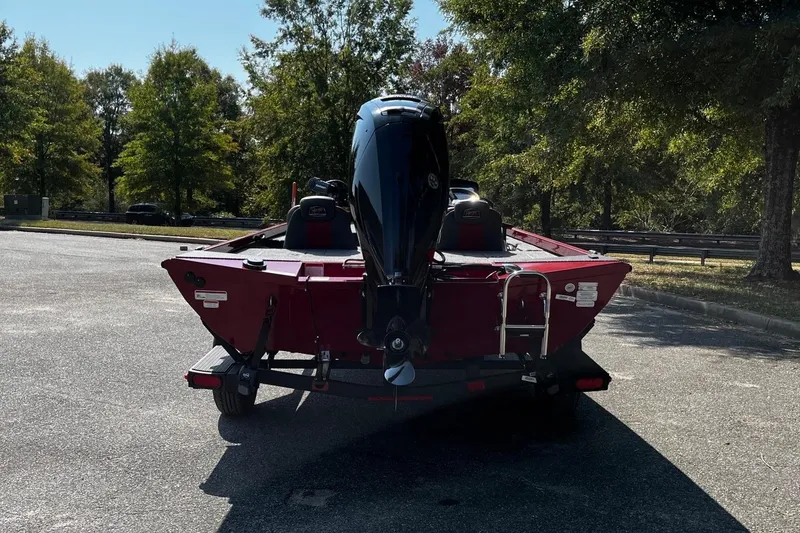 Slide: The Image of 2026 Ranger RT178 boat on trailer, parked outdoors, rear view. - 4