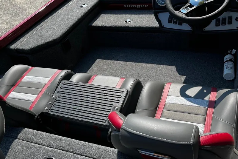 Slide: The Image of 2026 Ranger RT178 boat interior with stylish seats and steering wheel. - 8