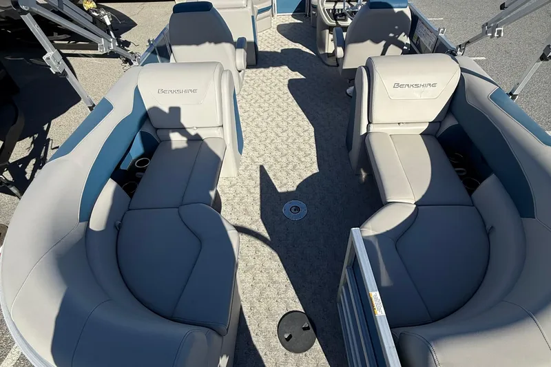 Slide: The Image of 2025 Berkshire 22RFX LE 2.75 pontoon boat interior with plush seating and modern design. - 21