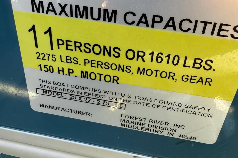 Slide: The Image of Capacity label for 2025 Berkshire 22RFX LE 2.75, 11 persons or 1610 lbs, 150 HP motor. - 26