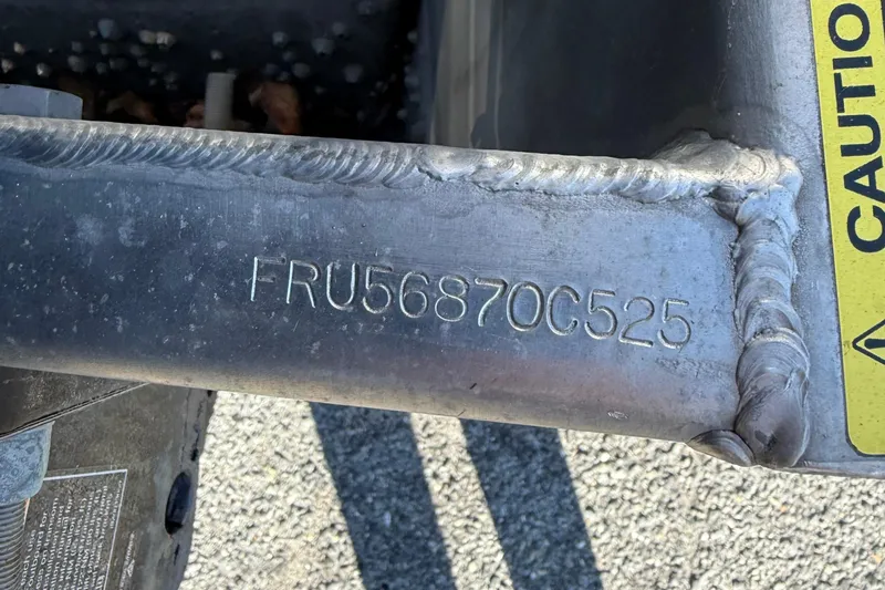 Slide: The Image of VIN number on a 2025 Berkshire 22RFX LE 2.75 boat frame. - 27