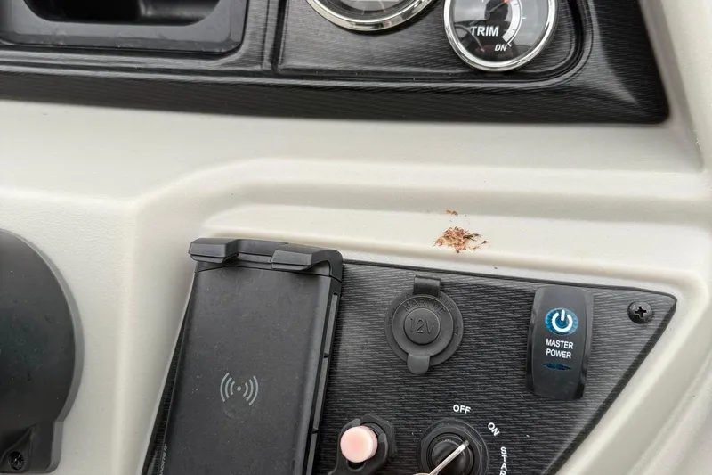 Slide: The Image of 2025 Berkshire 24CL 2.75 LE pontoon boat interior with spacious seating and helm. - 11