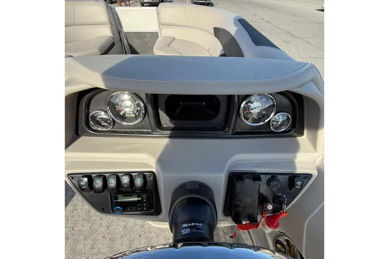 Slide: The Image of Dashboard of 2025 Berkshire 24CL 2.75 LE pontoon boat with gauges and controls. - 14