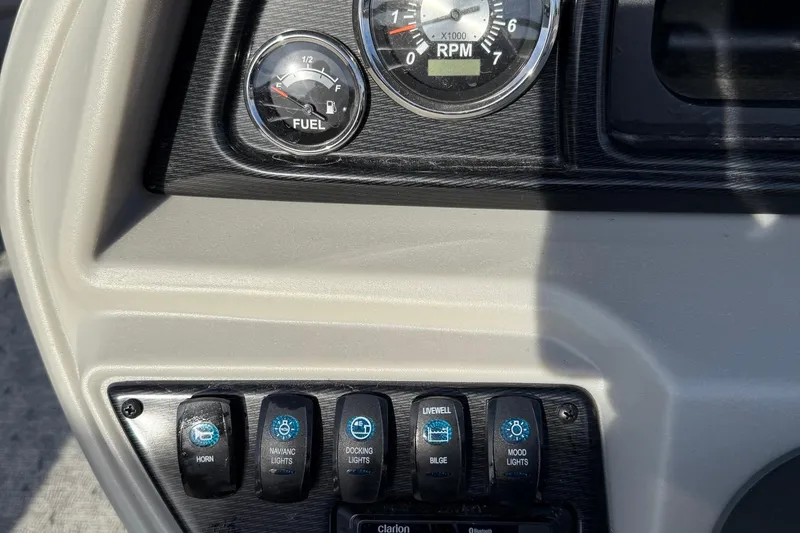 Slide: The Image of Dashboard of 2025 Berkshire 24CL 2.75 LE with fuel gauge and control switches. - 15