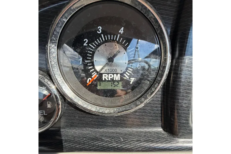 Slide: The Image of 2025 Berkshire 24CL 2.75 LE pontoon boat with spacious seating and modern design. - 9