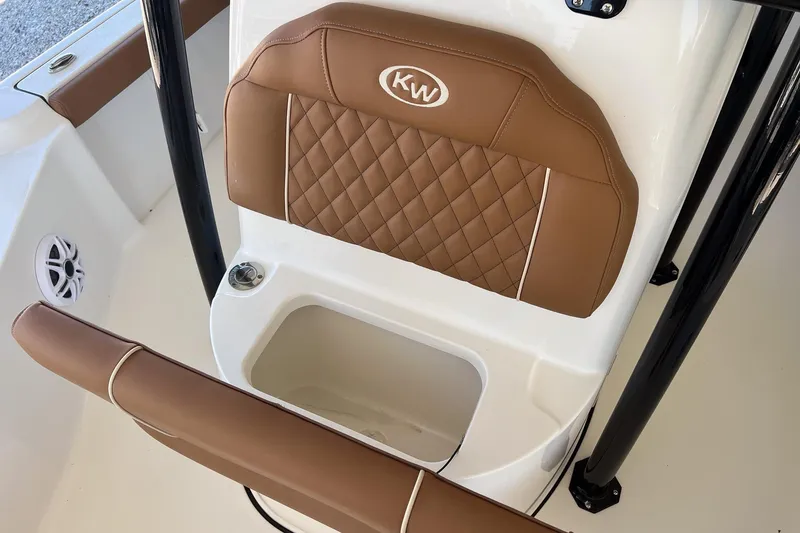 Slide: The Image of 2026 Key West 230 Bay Reef boat seat with brown diamond-stitched upholstery. - 17
