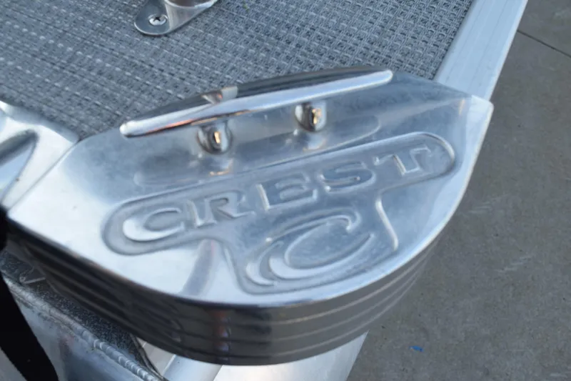 Slide: The Image of 2024 Crest Classic LX 220 SLC boat cleat with embossed logo. - 17