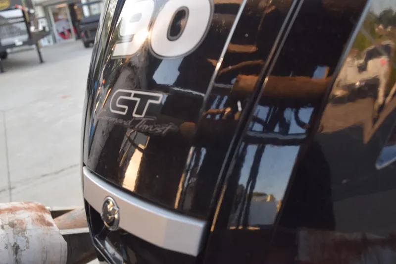 Slide: The Image of 2024 Crest Classic LX 220 SLC boat engine detail with GT logo. - 6