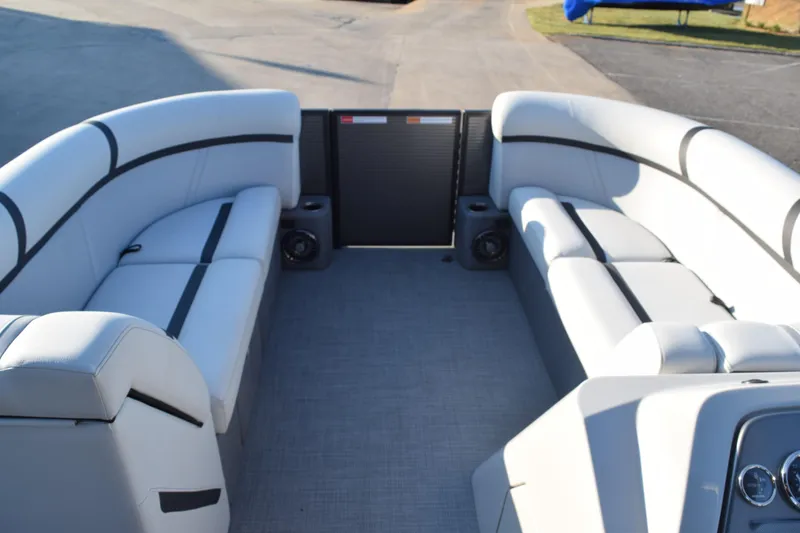 Slide: The Image of 2024 Crest Classic LX 220 SLC boat interior with spacious seating and modern design. - 8