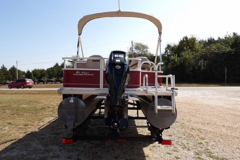 Slide: The Image of 2018 Sun Tracker BASS BUGGY® 18 DLX pontoon boat with canopy and outboard motor. - 13