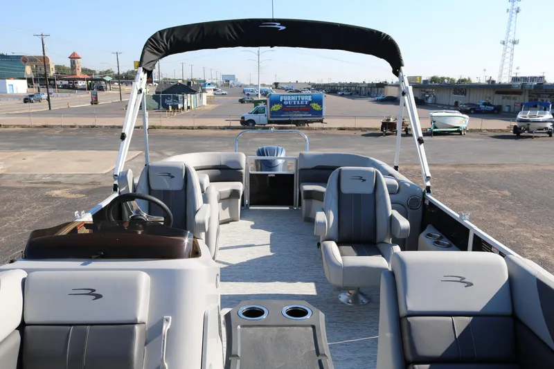 Slide: The Image of 2026 Bennington 22SX Stern Radius pontoon boat with spacious seating and modern design. - 10