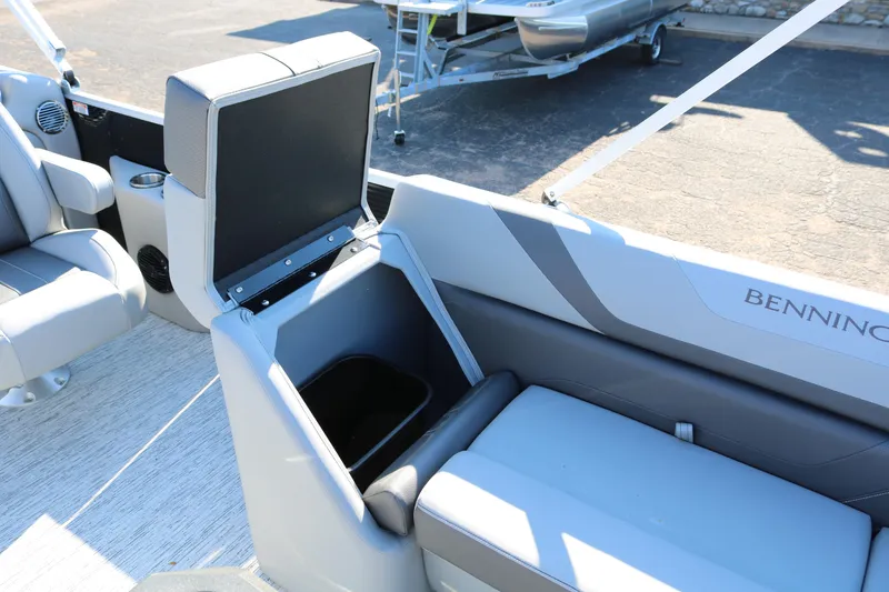 Slide: The Image of 2026 Bennington 22SX Stern Radius boat interior with open storage compartment. - 14